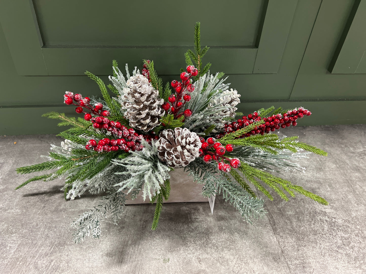 Red Berry with Frosted Greens in Cement Container