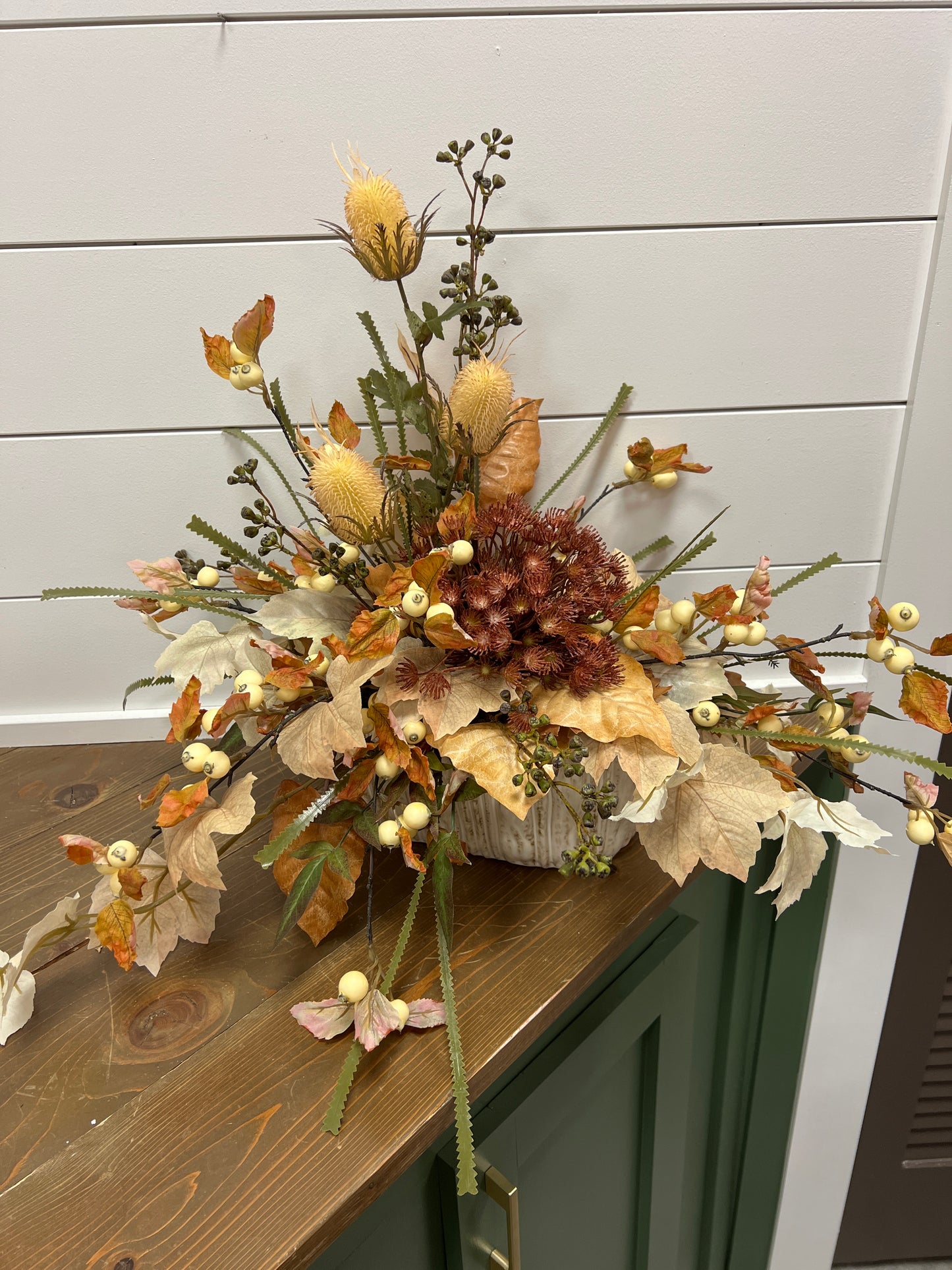 Orange Thistle Arrangement with Leaves