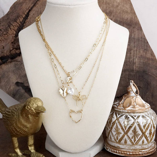 Sweet Keepsake – Multi-Layer Necklace with Hearts, Bow & Pearl