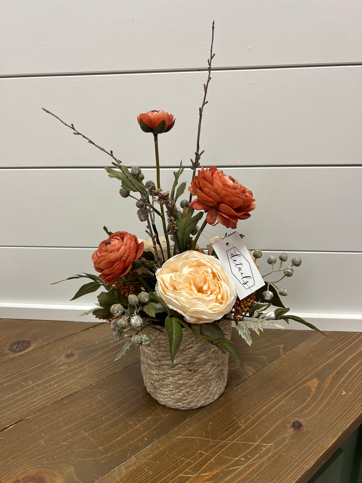Orange Ranunculus in Wicker Basket