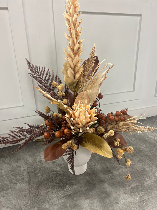 Protea with tall silk in white vase