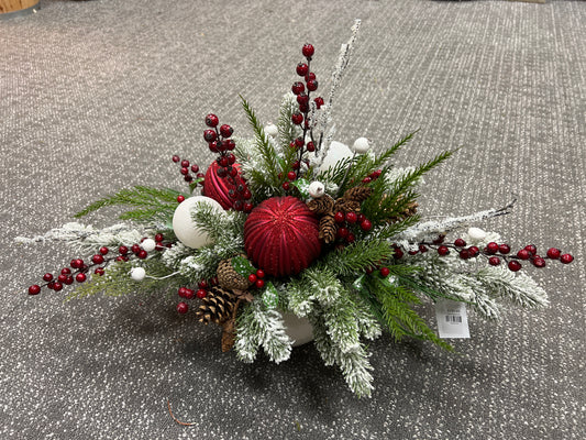 Red Ornaments with greenery in white container